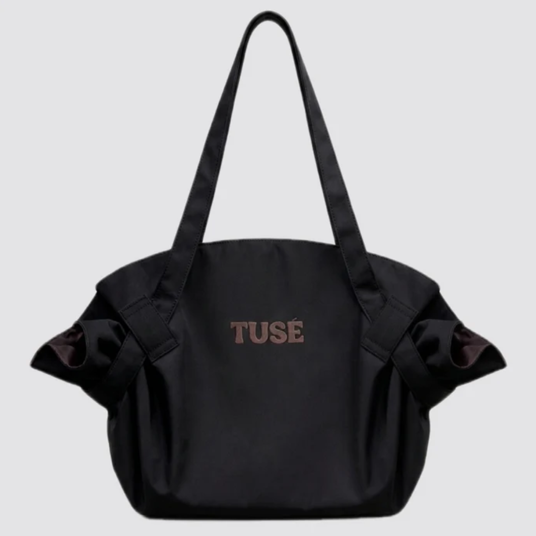 TUSÉ - La Bolsa que lo Carga Todo