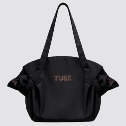 TUSÉ - La Bolsa que lo Carga Todo